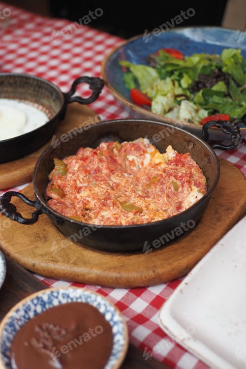 Preview: Turkish Menemen omelet in a frying pan. .