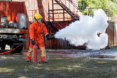 Preview: Fireman wearing fire protection suite and oxygen tank exercise hold extinguisher tank and pray