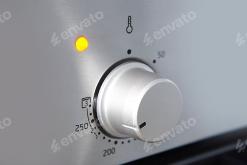 Preview: Oven cooking temperature control knob. Kitchen equipment panel detail. Stove