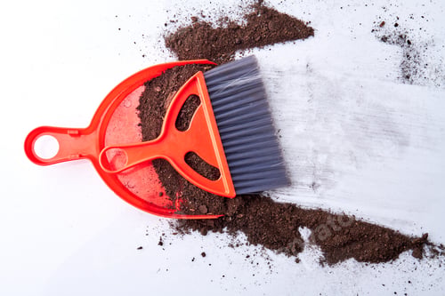 Preview: Dustpan and dust brush on the dirty floor