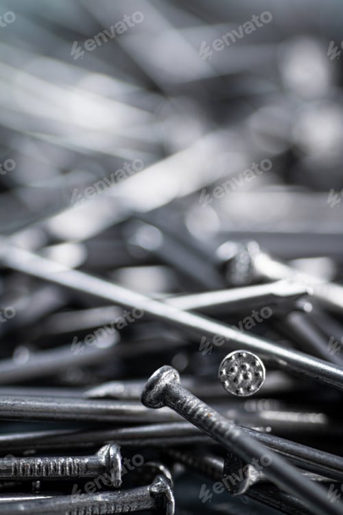 Preview: A bunch of nails on the table.