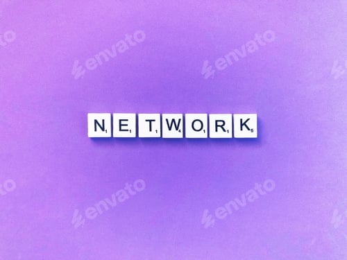 Network Spelled Out with Letter Tiles on Purple