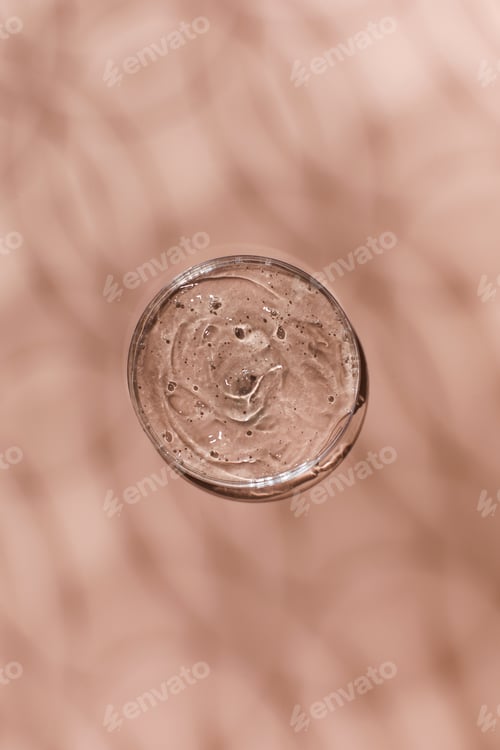 Preview: Hyaluronic acid in a petri dish with shadow drawing. The texture of a cosmetic product.