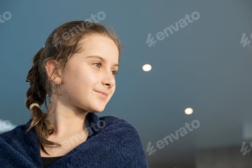 Preview: Wet ambitious girl dreaming of new achievements in swimming
