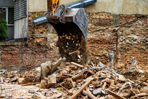 Preview: Digger bucket cleans up waste.