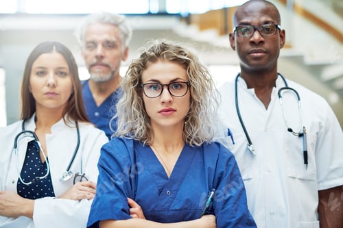 Preview: The medics in hospital looking at camera