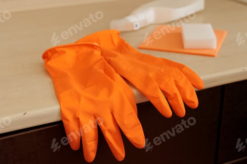 Preview: Cleaning the house and kitchen with dirt removal tools using a sponge and gloves.