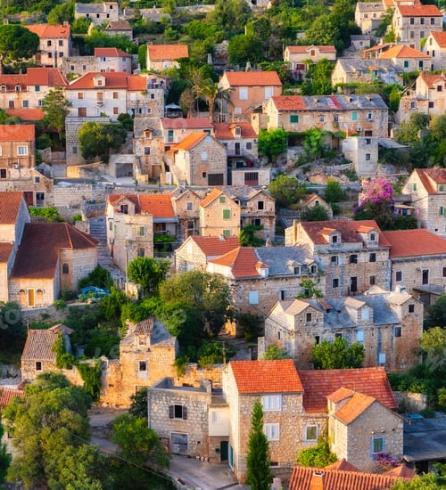 Preview: Croatia. Ols town as a background. Houses on the mountain hill during sunset