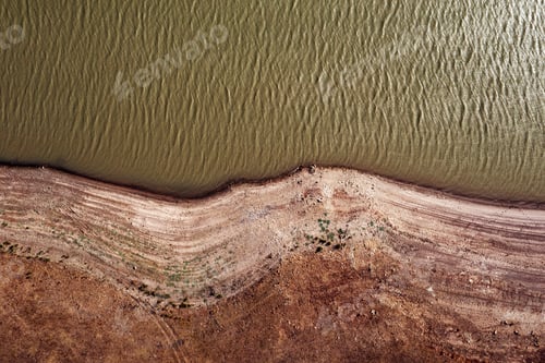 Preview: drone view of river with rippled water flowing