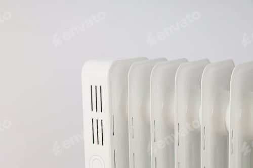 Preview: Modern white electric heater against light background
