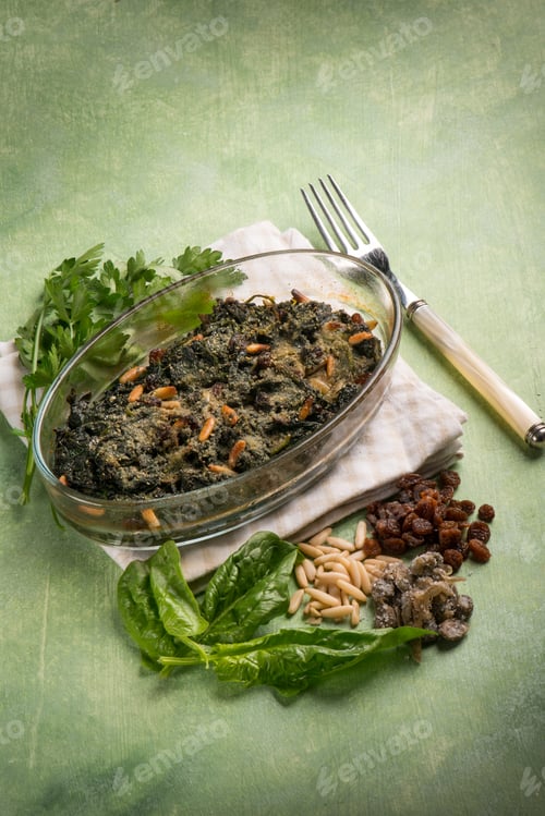 Preview: oven spinach with pine nuts dried grape and capers