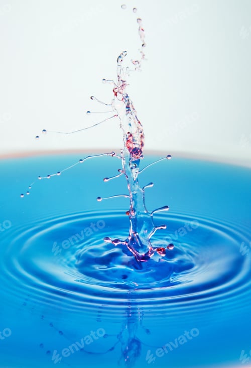 Preview: Abstract background of splash of color water, collision of colored drops