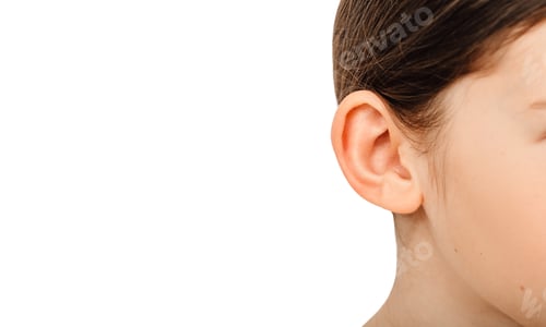 Preview: Child ear close-up isolated on a white background. Treatment and hearing test, hearing exam concept