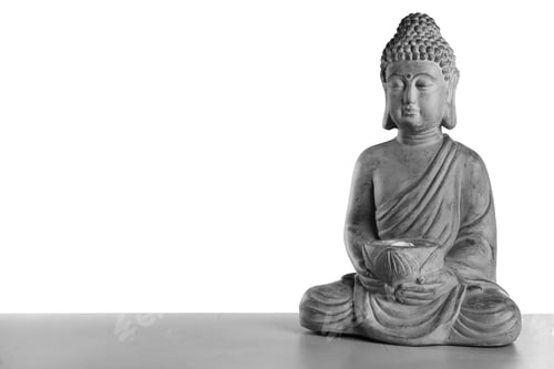 Preview: Beautiful stone Buddha sculpture on table against grey background. Space for text