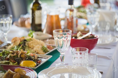 Preview: Banquet wedding table setting on evening reception waiting guests