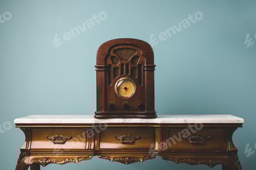 Preview: Close-up view of an old vintage radio on a table.
