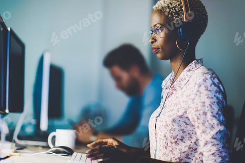 Preview: Female software developer working for IT company