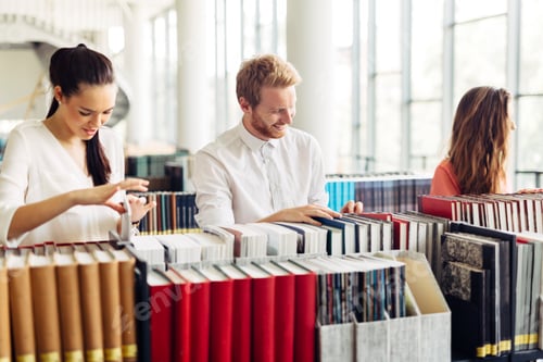 Preview: Group of students studying in library