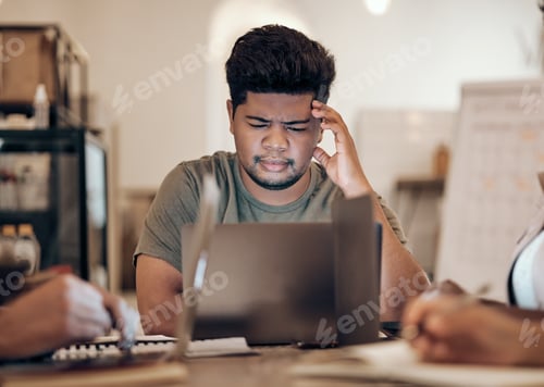 Preview: Businessman, thinking and stress on laptop in modern office, startup or creative company with ideas
