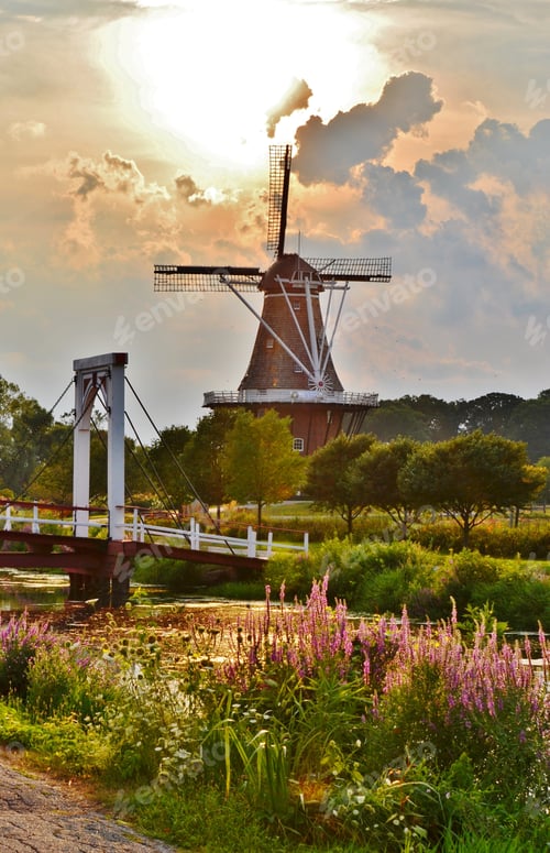 Preview: Sustainable living windmill and gardens at sunset