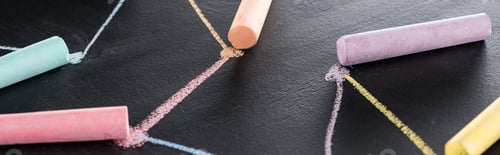 Preview: panoramic shot of colorful chalk on black surface with connected drawn lines, connection concept