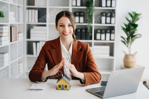Preview: Female real estate agent is use hands to protect red roof for the concept of real estate investment