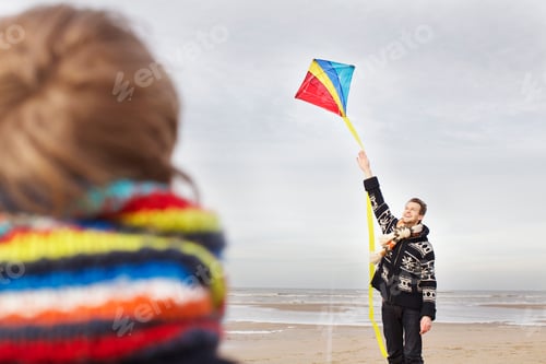 Preview: Mid adult man and son with kite on beach, Bloemendaal aan Zee, Netherlands