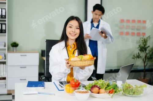 Preview: Professional nutritionist reviewing fresh vegetables and supplements for diet planning, health care,
