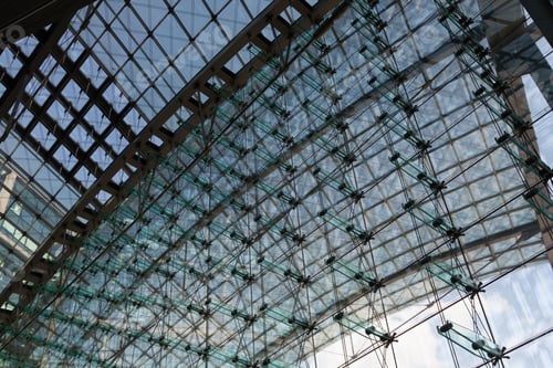 Preview: Low angle shot of the inside of a building made with glass