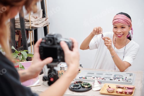 Preview: Woman posing for photo with necklace