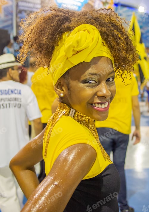 Preview: Rio de Janeiro, Brazil - February 13 2014: Cheerful samba dancer looking at camera