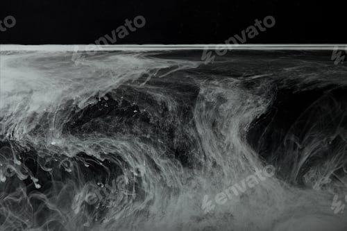 Preview: abstract flowing swirls of grey paint in water
