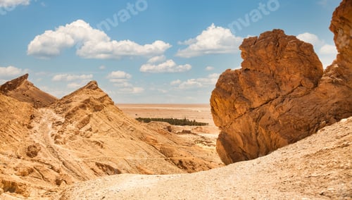 Preview: Panoramic view of landscape Sahara desert, sandy mountains and stones sunny day