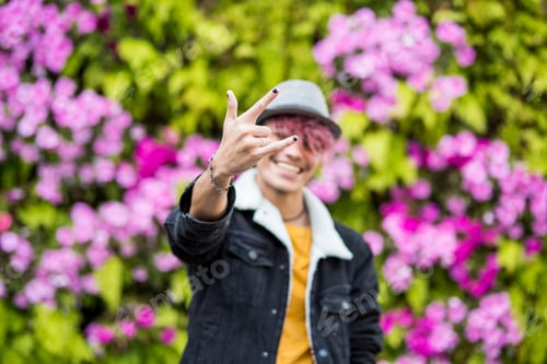 Preview: Happy cheerful handsome trendy alternative young man teenager portrait