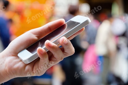 Preview: Teenage girl text messaging on her phone