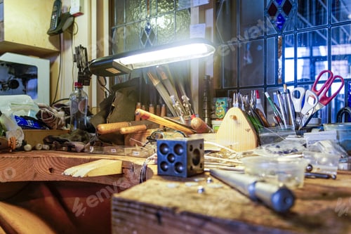 Preview: Closeup shot of a worktable with tools scattered across it in Doesburg, Netherlands