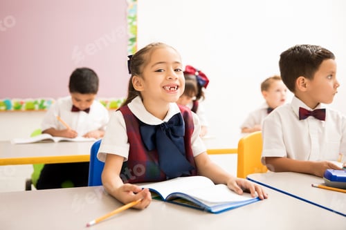 Preview: Cute girl with missing teeth in school