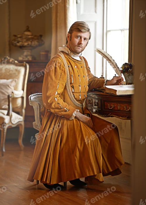Preview: I have urgent correspondence for the the king. Shot of an aristocratic man at his writing table.