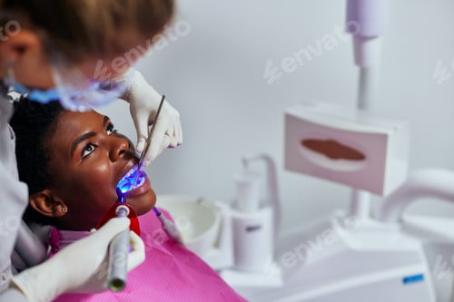 Preview: Dentist is working with patient in his office