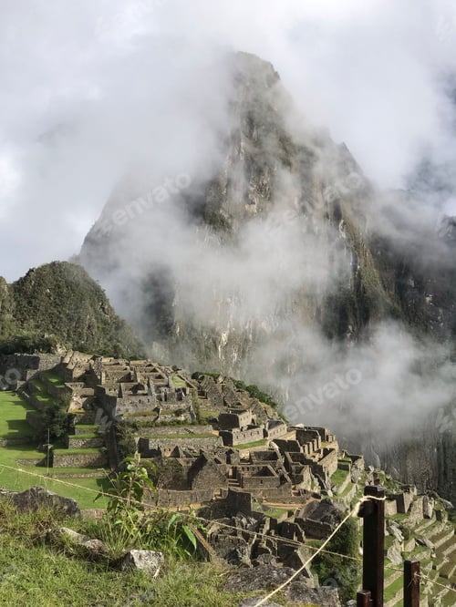 Preview: Scenic view of Machu Picchu hidden in clouds. Peru.