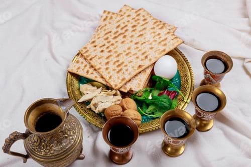 Preview: Jewish family celebrating passover, matzoh jewish holiday bread with kiddush four cup of wine
