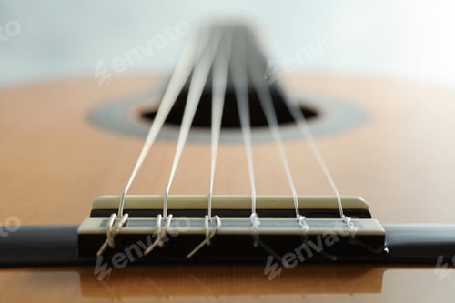 Preview: Beautiful six - string classic guitar on white background, closeup