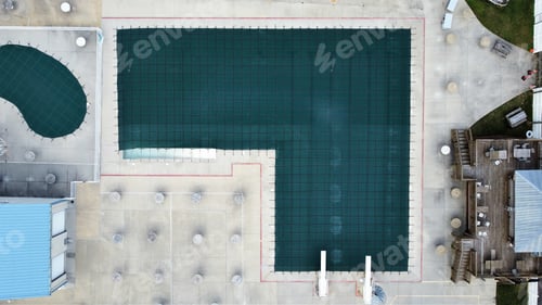 Preview: Top view of a winterized pool outdoors