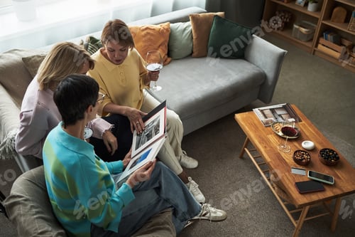 Preview: Group of Young Adult Caucasian Women Relaxing and Sharing Memories Together