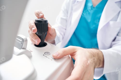 Preview: Ophthalmologist is working at the refraction machine