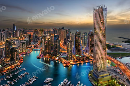 Preview: Tall buildings of Marina Bay in Dubai, the UAE during sunset