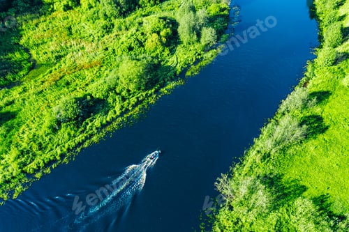 Preview: A Scenic Aerial View of a Serene River Flowing Through Lush Green Landscape