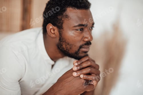 Preview: Portrait of candid authentic black and beautiful person man posing at home