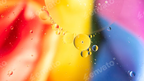 Preview: Chaotic motion. Abstract paint. Flat lay. Movement bubbles in the liquid. Water surface multicolored