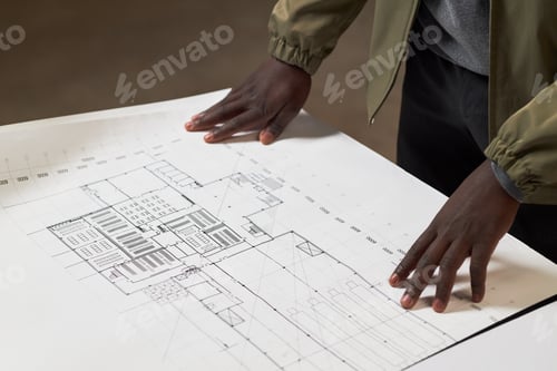 Preview: Unrecognizable Man Looking at Office Planning